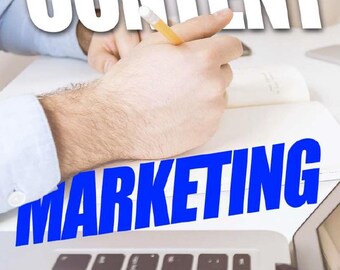 May include: Image with the words "CONTENT MARKETING BLUEPRINT" in large white and blue text. A person is writing in a notebook with a pencil. A laptop is in the background.