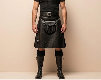 May include: A black leather kilt featuring a wide waistband with a silver-toned buckle, a matching black leather sporran with three decorative tassels, and a small silver-toned side buckle. The kilt is paired with black knee-high boots and black socks.