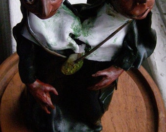 Weird Sisters, an original and unique hand-sculpted Siamese-twin nun couple.