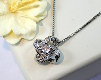 Sterling Silver Infinity Knot Necklace: Cubic Zirconia Pendant