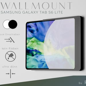 May include: A black wall mount for a Samsung Galaxy Tab S6 Lite tablet. The mount is designed to be inserted into the wall, rather than glued on. The text "WALL MOUNT" and "SAMSUNG GALAXY TAB S6 LITE" is printed in white on a black background. The text "by RLD" is printed in white on a black background.