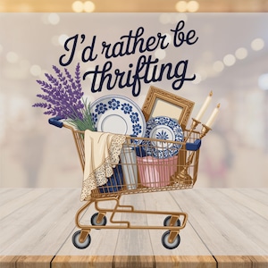 May include: A shopping cart illustration filled with vintage items. The cart contains blue and white plates, a framed picture, candles, and a bouquet of lavender. The text "I'd rather be thrifting" is at the top.