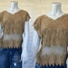 see more listings in the Pulls Tops et Jupes section