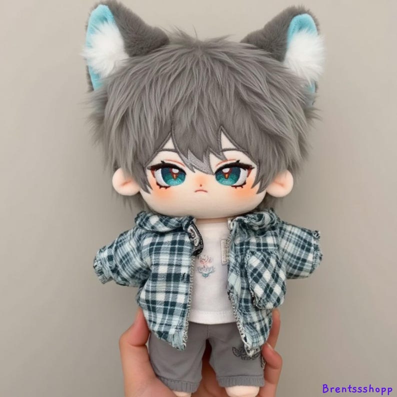 May include: A plush toy with gray hair, blue eyes, and a plaid shirt. The toy is wearing a pair of gray pants and has blue wolf ears.