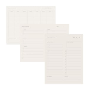 May include: A set of three beige paper planners. The top planner is a monthly overview with a calendar grid. Below it are weekly and daily overview planners. The planners have lines for notes and tasks, with the text "Monthly Overview", "Weekly Overview", and "My Daily Overview".