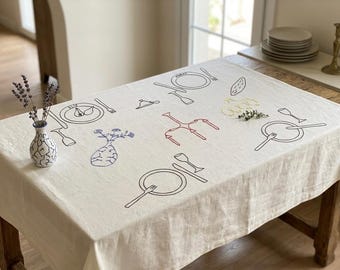 Ręcznie haftowany lniany obrus, minimalistyczny wystrój jadalni, spersonalizowane nakrycie głowy (dla 4 osób)