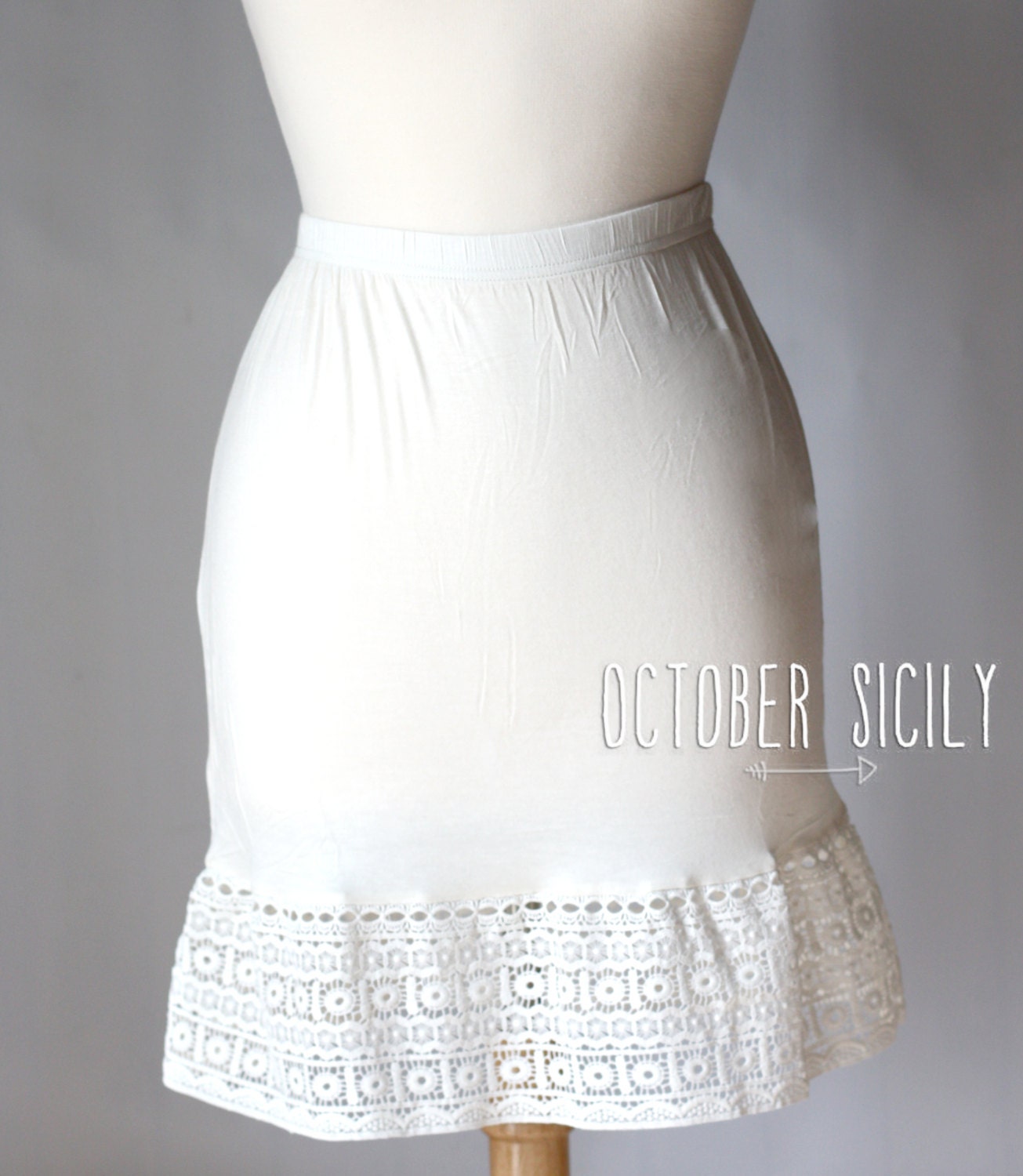 Romper with skirt clearance extender