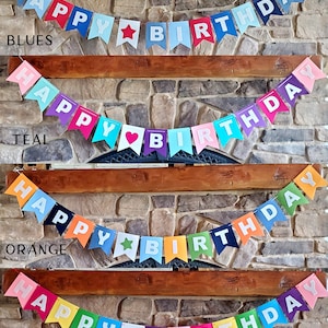 May include: Six felt banner options for a birthday party. Each banner says "Happy Birthday" in different colors with a different design element in the middle. The options are: Brights, Blues, Teal, Orange, Pinks, and Classic.