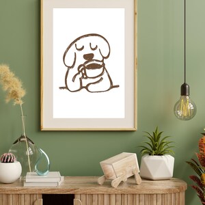 Minimalist digital art print featuring a dog sipping coffee in coffee-brown tones. A quirky, cute, and modern design, this print is a great gift for dog and pet lovers and coffee enthusiasts. This print is ideal for home, kitchen, or office decor. Keywords: coffee wall art, cute coffee print, minimalist dog drinking coffee, cafe wall art, modern coffee art, cute kitchen print, dog lover gift, cute dog art, coffee lover gift, coffee lover art, coffee lover, dog lover, dog lover art, cute kitchen