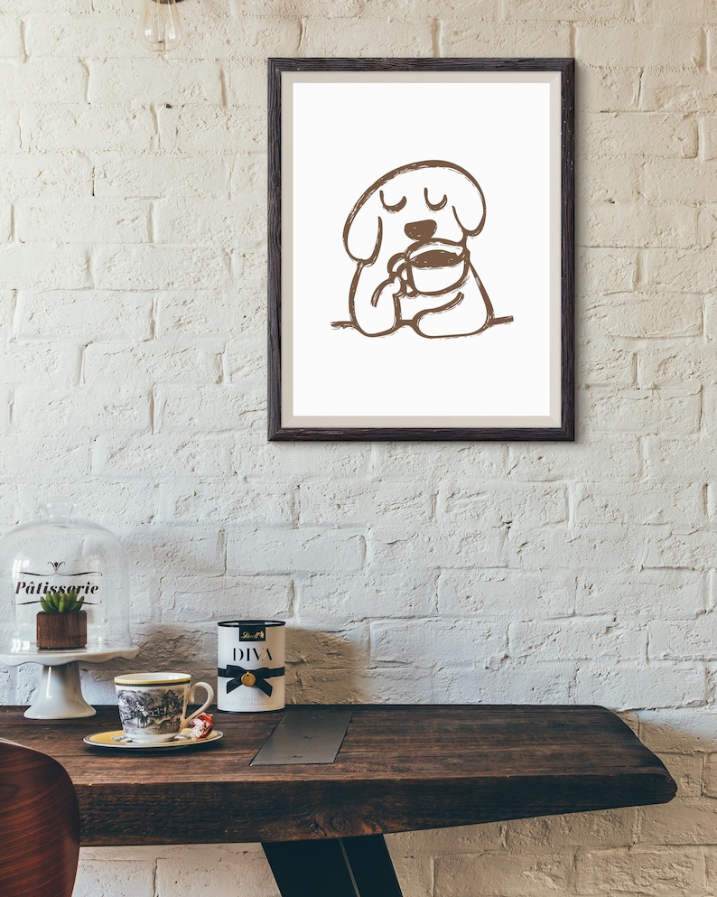 Minimalist digital art print featuring a dog sipping coffee in coffee-brown tones. A quirky, cute, and modern design, this print is a great gift for dog and pet lovers and coffee enthusiasts. This print is ideal for home, kitchen, or office decor. Keywords: coffee wall art, cute coffee print, minimalist dog drinking coffee, cafe wall art, modern coffee art, cute kitchen print, dog lover gift, cute dog art, coffee lover gift, coffee lover art, coffee lover, dog lover, dog lover art, cute kitchen