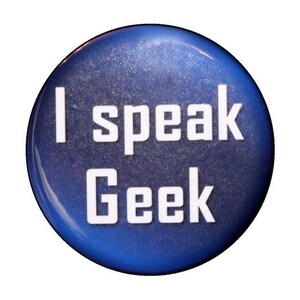May include: A blue round button with white text that reads "I speak Geek".