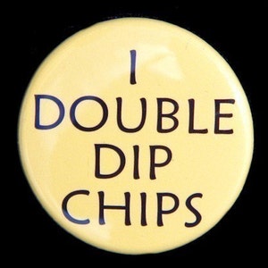 May include: A yellow button with black text that reads "I double dip chips".