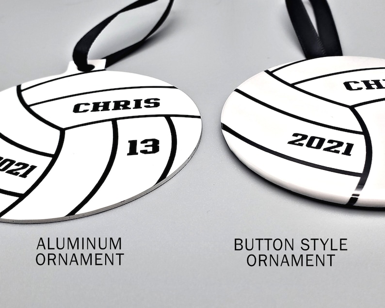 May include: Two volleyball-themed Christmas ornaments, one with an aluminum finish and the other with a button-style finish. Both ornaments feature the name "CHRIS" and the number "13", along with the year "2021".
