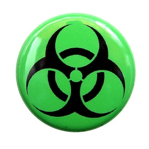 May include: A green button with a black biohazard symbol.