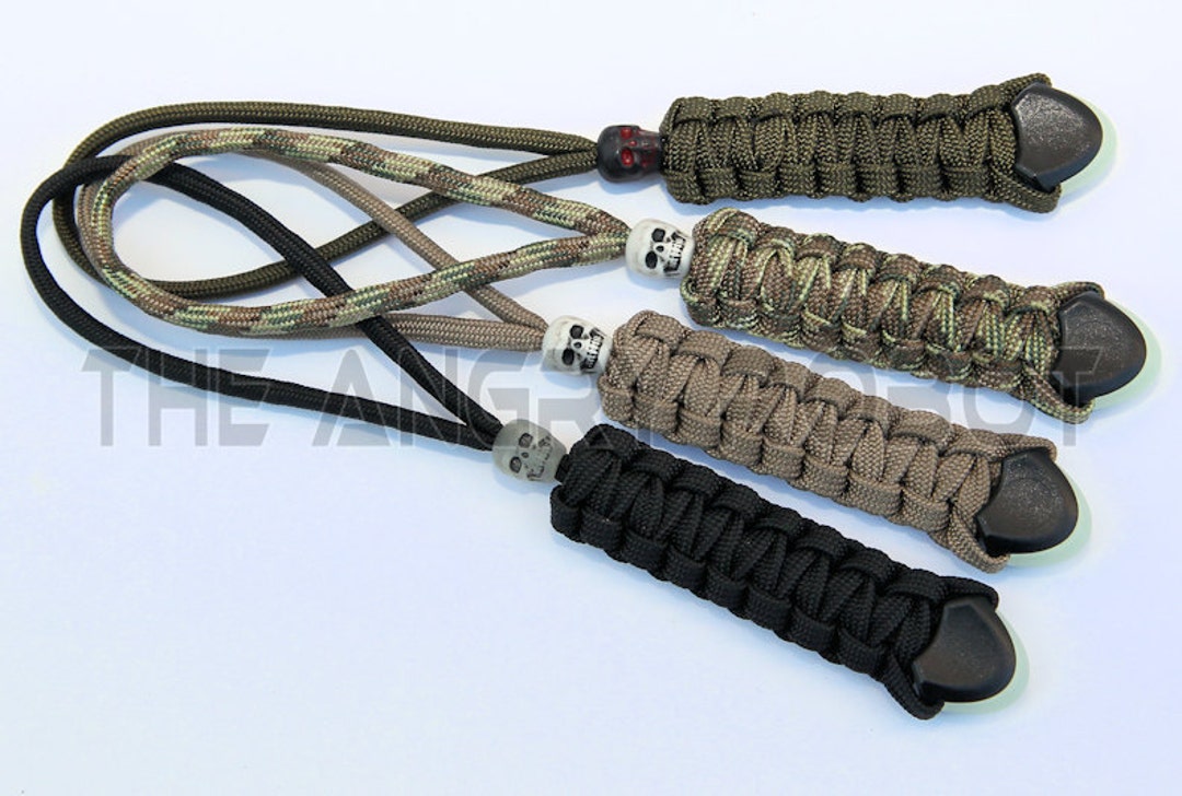 Set of 4 Paracord Lanyards With Glow Ends and Skull Beads Zipper