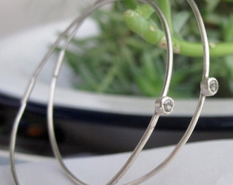 Sterling silver round wire hoops with a 2.5mm white topaz 0189