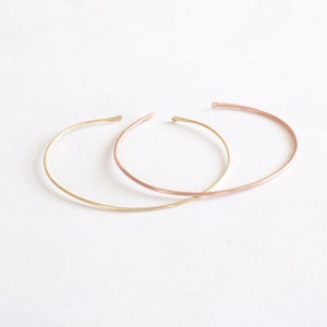 Thin Dainty 1.3mm Cuff Bracelet with Hammered Ends matte brass (left) and copper (right) 0178 Virginia Wynne Designs VWD