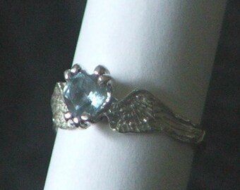Sterling Silver Angel Wing Ring with Sky Blue Topaz Heart, Size 7 3/4
