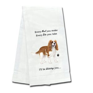 May include: White kitchen towel featuring a Cavalier King Charles Spaniel illustration. Text reads "Every Meal you make, Every Bite you take, I'll be Watching you...". Includes a paw print graphic.