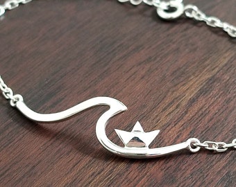 ROGUE WAVES - sterling silver bracelet with a wave and a paper boat