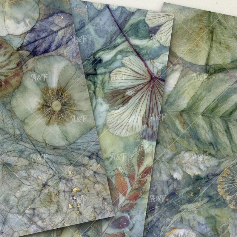 May include: A collection of watercolor paper sheets featuring botanical designs. The sheets display a variety of leaves and flowers in shades of green, blue, and brown, with gold accents. The paper has a textured appearance, with the letters "A&F" repeated across the surface.