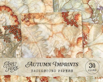 May include: A collection of 30 background papers titled Ash & Fern Autumn Imprints, featuring botanical patterns of ferns, leaves, and red berries in warm orange, brown, and cream tones with a weathered, vintage-style parchment texture.