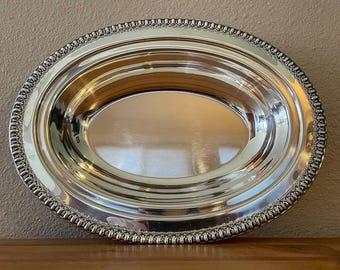Silverplated oval serving platter by Wilcox International Silver Co.