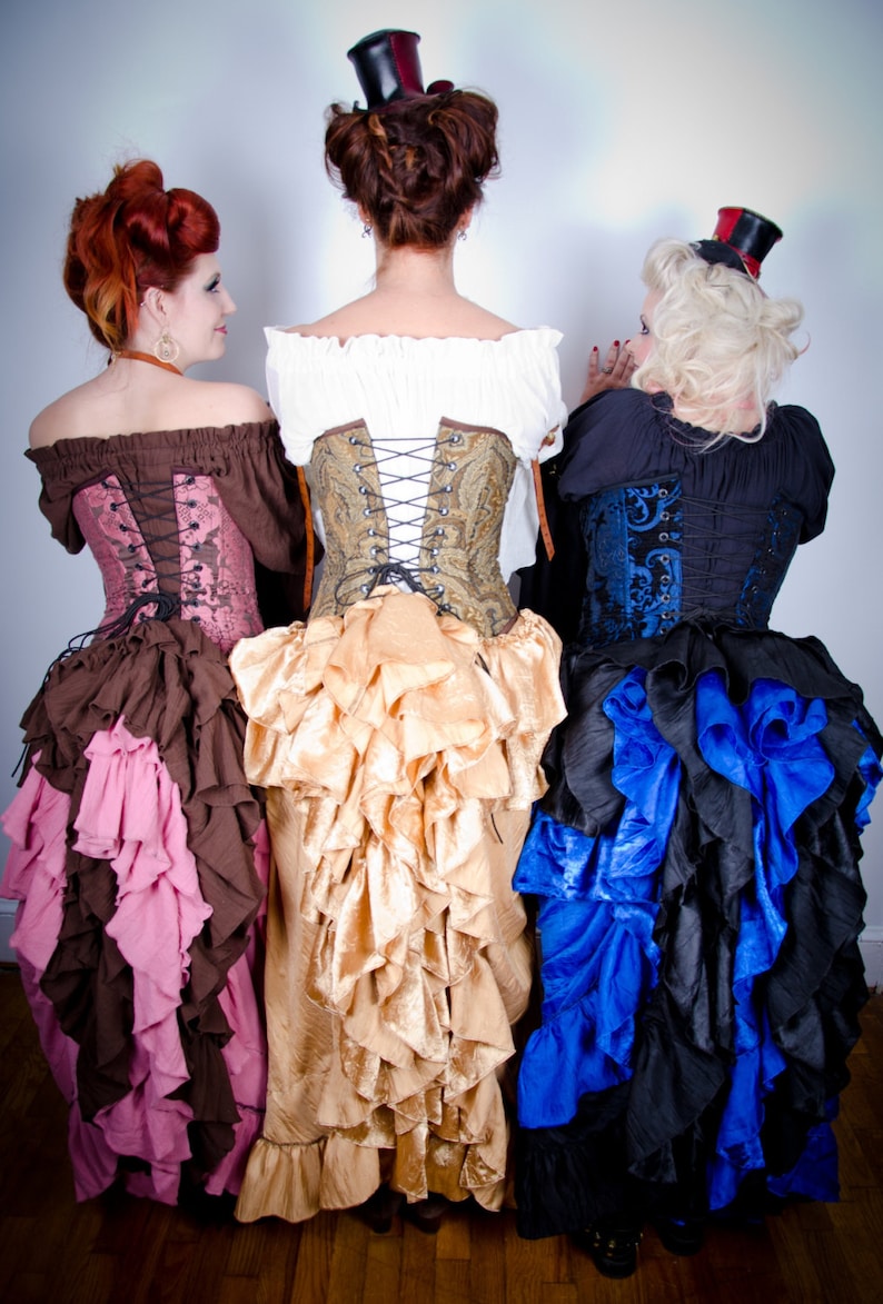 Steampunk Skirts | Bustle Skirts, Lace Skirts, Ruffle Skirts     Custom Choose Your Color Fancy Saloon Skirt Medieval Renaissance Western Steampunk Victorian Ruffle Bustle Long Skirt High-Low Style  AT vintagedancer.com