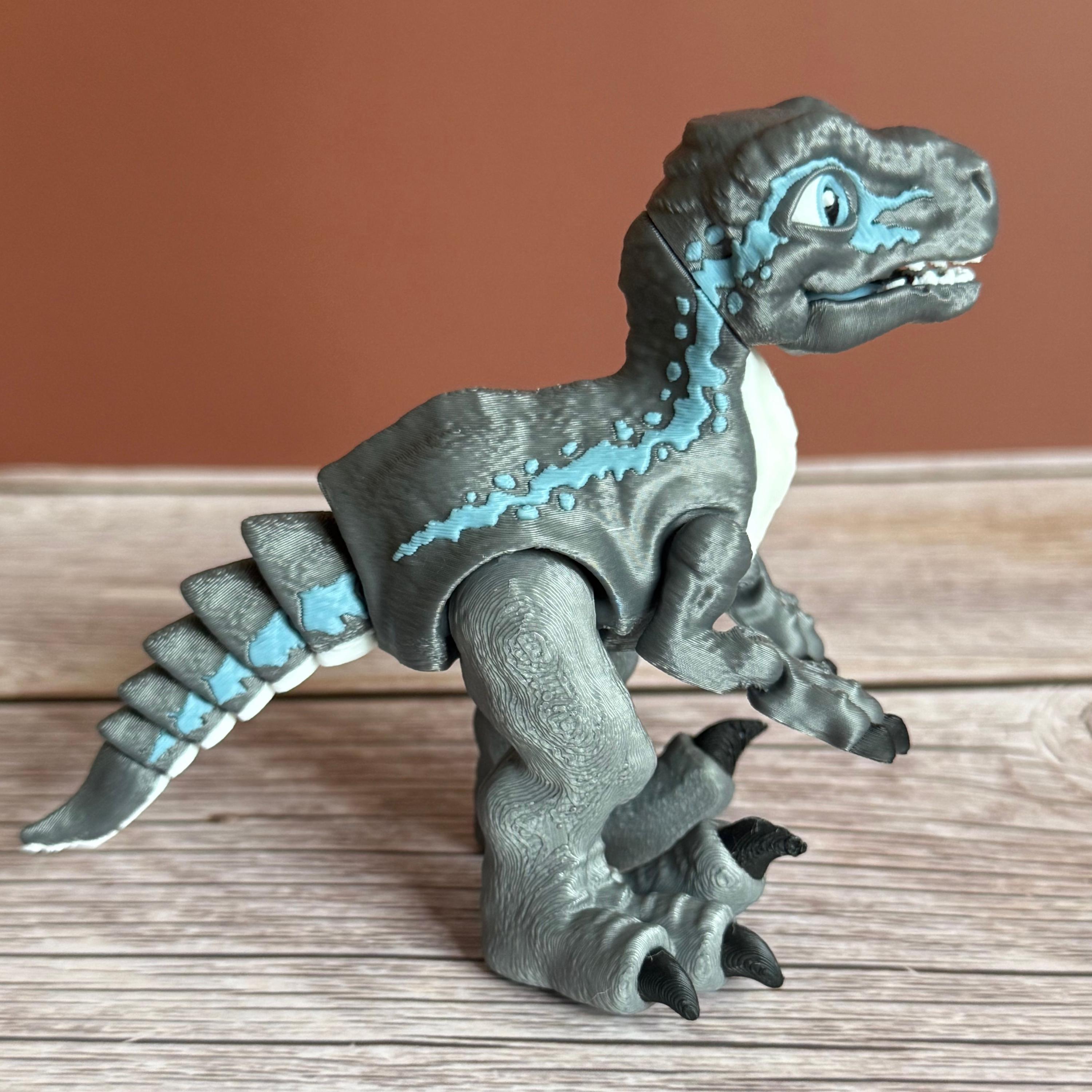 Articulated Raptor 3D Printed Toy: Movable Dinosaur Figure - Etsy