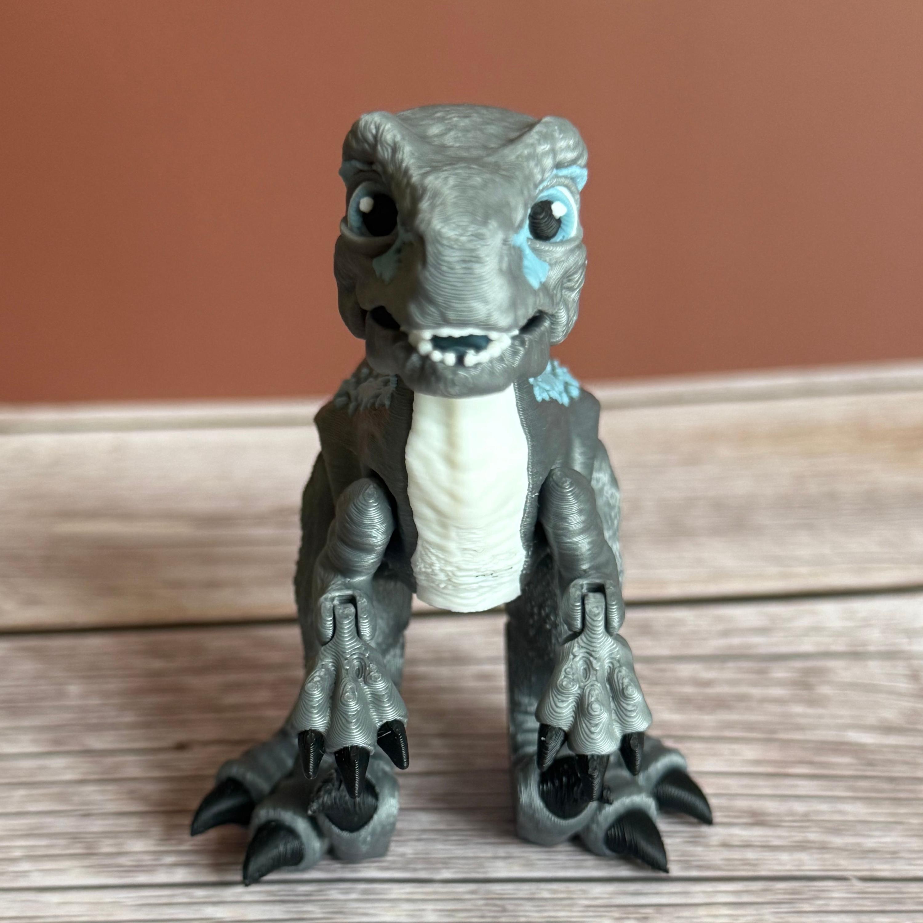 Articulated Raptor 3D Printed Toy: Movable Dinosaur Figure - Etsy