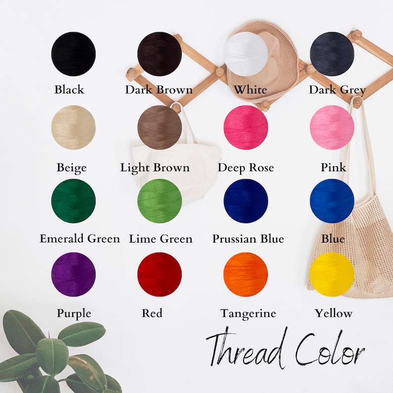 Puede incluir: Una carta de colores que muestra los colores de hilo, incluyendo negro, marr&oacute;n oscuro, blanco y gris oscuro. Otros colores incluyen beige, marr&oacute;n claro, rosa intenso, rosa, verde esmeralda, verde lima, azul prusiano, azul, morado, rojo, mandarina y amarillo. El texto "Thread Color" est&aacute; en la parte inferior.