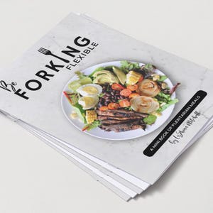 May include: A white booklet with the title "Be Forking Flexible" and a black and white illustration of a salad bowl with various ingredients. The subtitle is "A Mini Book of Flexitarian Meals by Leanne Elyse Smith".