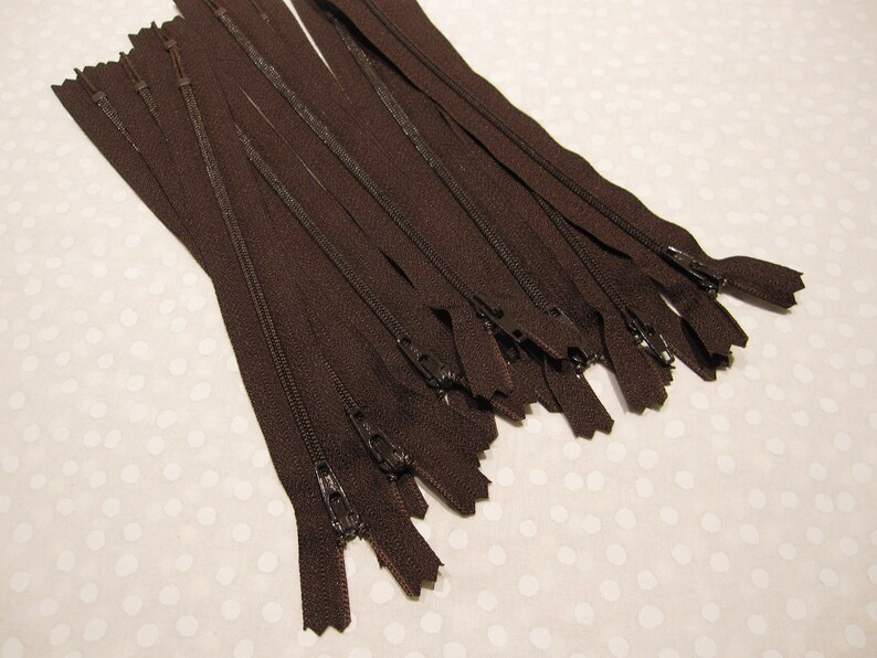 Eight dark brown zippers that are 8 long sewing purse making