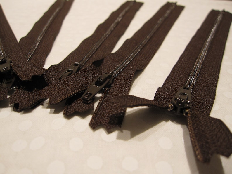 Eight dark brown zippers that are 8 long sewing purse making