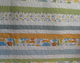 Baby Quilt with Dinosaurs and Polka Dots with blues and greens and yellows,baby quilt, baby gift, boys blanket,boys quilt,baby shower gift