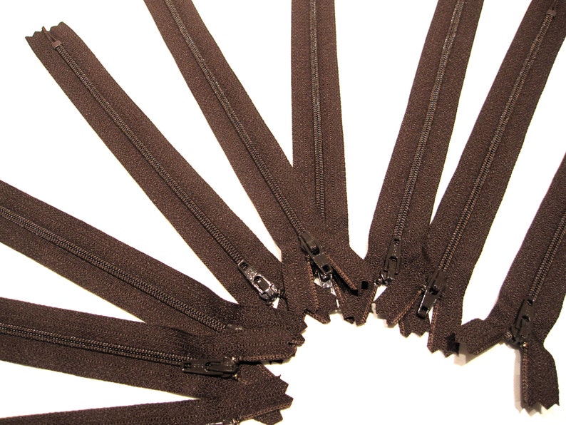 Eight dark brown zippers that are 8 long sewing purse making
