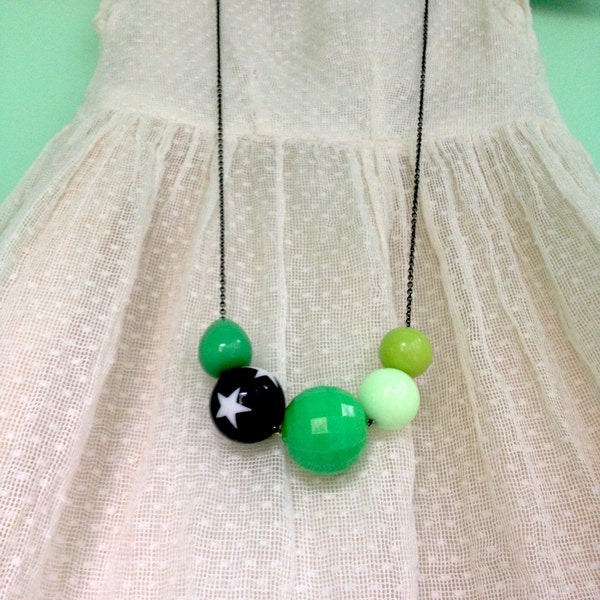 star bead and green.  a soul juice necklace.