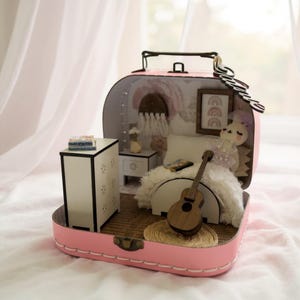 Small portable suitcase dollhouse toy or gift