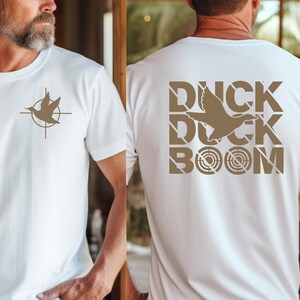 white tshirt brown font DUCK DUCK BOOM