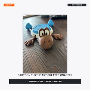 May include: A 3D printed articulated cartoon turtle coaster featuring a brown head with white eyes, a blue shell, and brown limbs. The text LCD CRAFT, STL DOWNLOAD, CARTOON TURTLE ARTICULATED COASTER, and 3D PRINT STL FILE DIGITAL DOWNLOAD are visible.