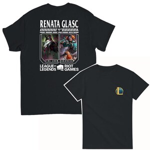 May include: Black t-shirt with a white graphic of Renata Glasc from League of Legends. The graphic includes the text "Renata Glasc", "The Chem-Baroness", "League of Legends", and "Riot Games".