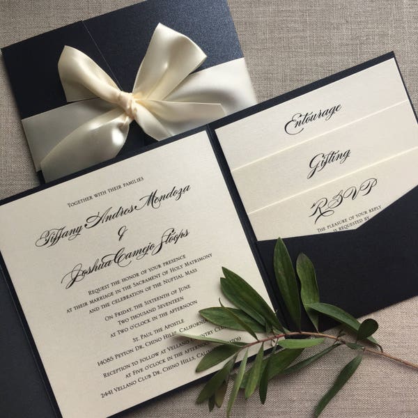 Elegant Black and Cream Pocketfold wedding invitation printed on linen pearlescent cardstock and and complete with a Satin bow