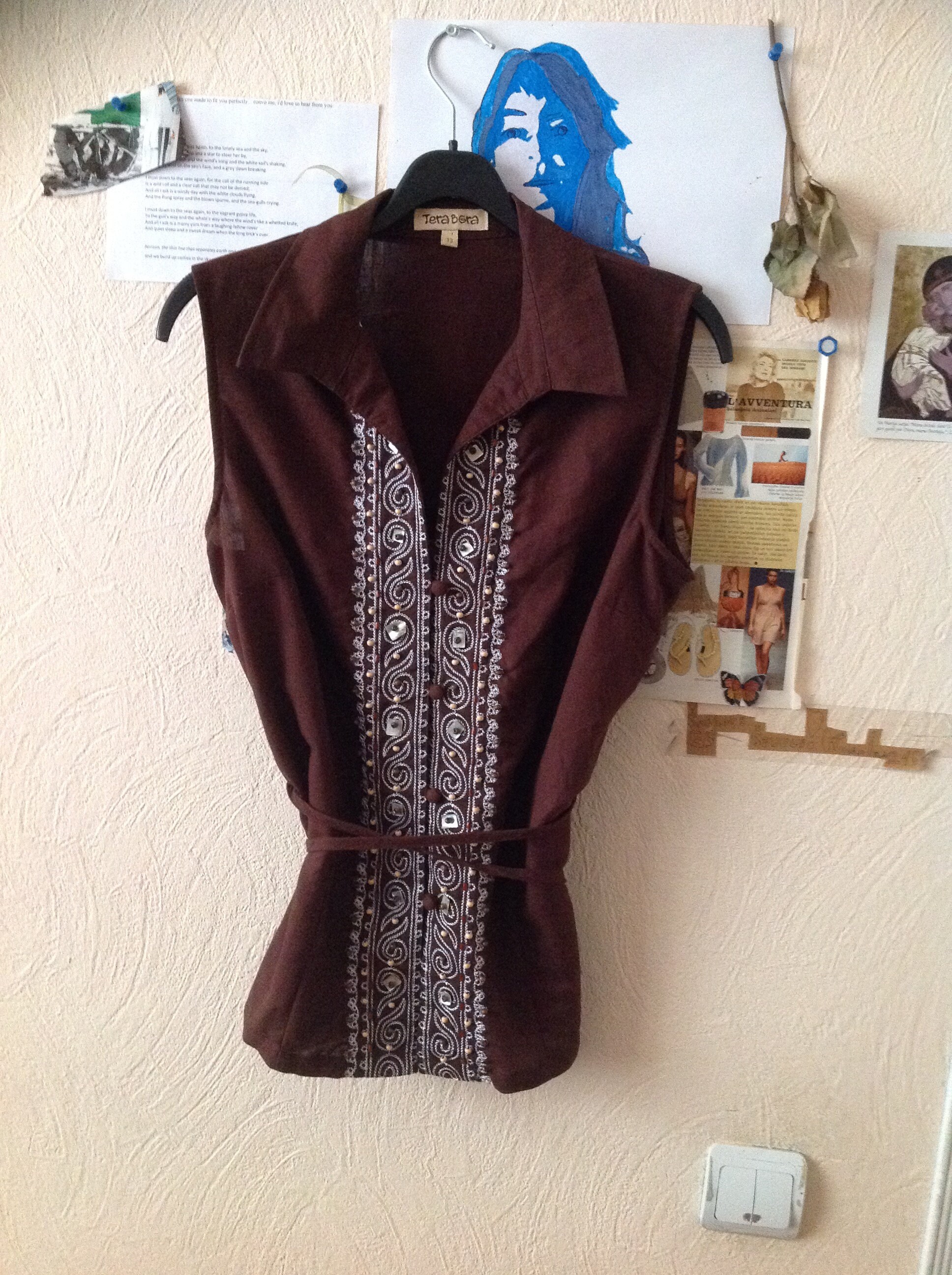 brown vest and pants