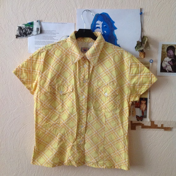 yellow short sleeve blouse
