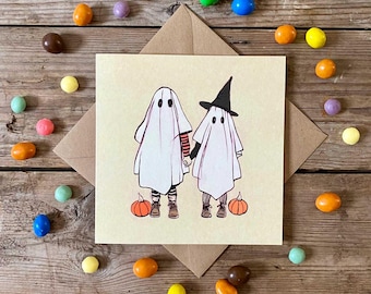 Tarjeta de felicitación de Halloween con fantasmas