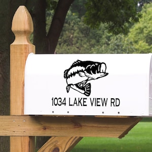 May include: White mailbox with a black bass fish graphic and the address 1034 LAKE VIEW RD.