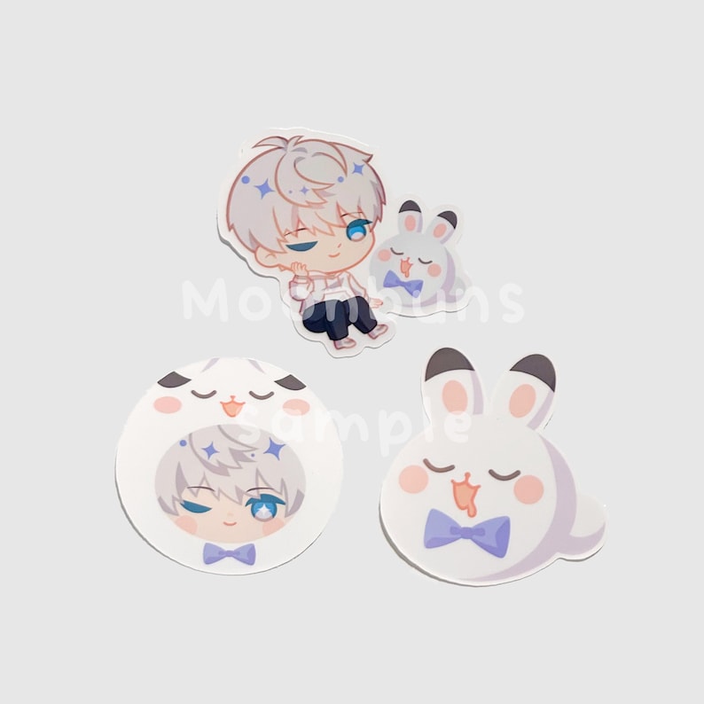 May include: Set of four stickers featuring anime-style illustrations. One sticker depicts a seated character with white hair and blue eyes. Another shows a small white bunny with a blue bow tie. The other two stickers show the character and bunny in different poses.