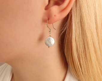 White Pearl Earrings. White coin pearl earrings with gold ear wires. Flat hammered gold ear wires with textured coin pearls.