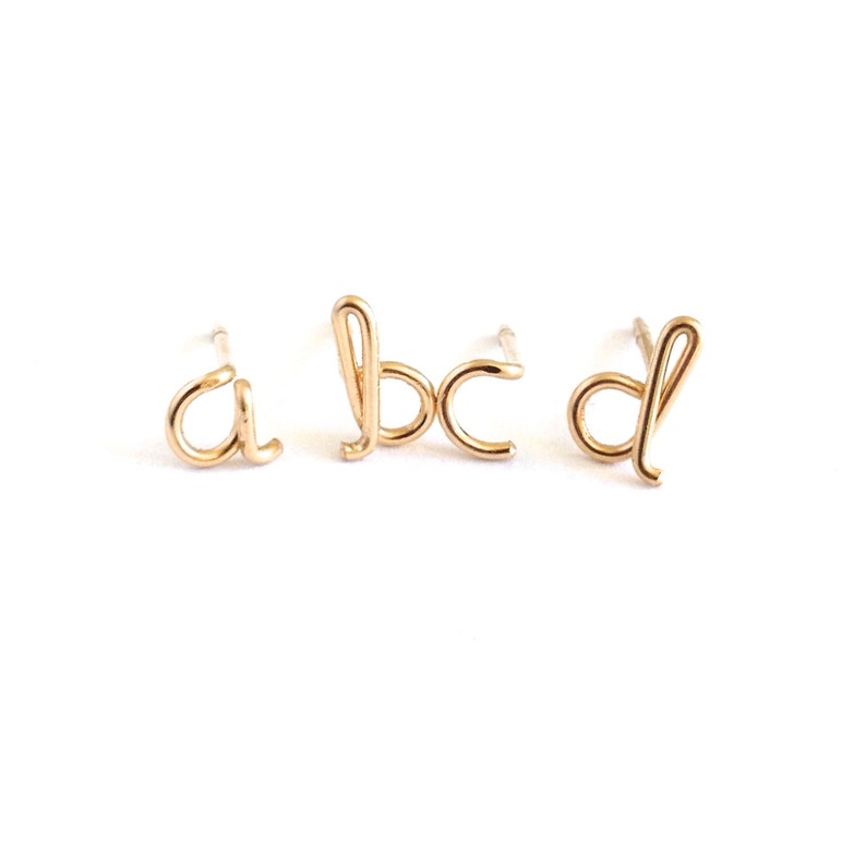 Gold Initial Earrings. 14k gold filled Small Dainty lowercase script earrings. Gold Letter Wire Studs. Aziza Jewelry image 1