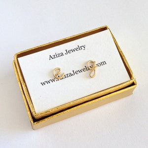 Gold Initial Earrings. 14k gold filled Small Dainty lowercase script earrings. Gold Letter Wire Studs. Aziza Jewelry image 4